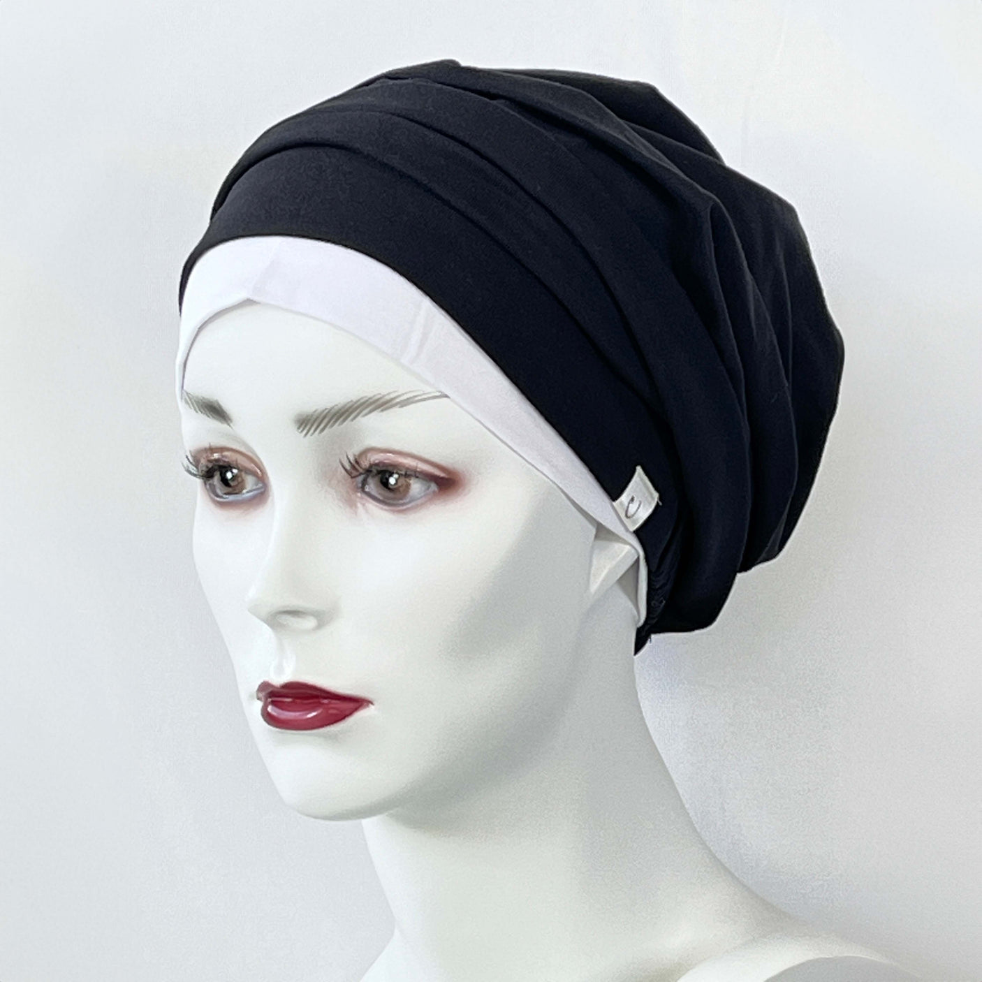 Zweiteiler aus Mützen und Untermützen