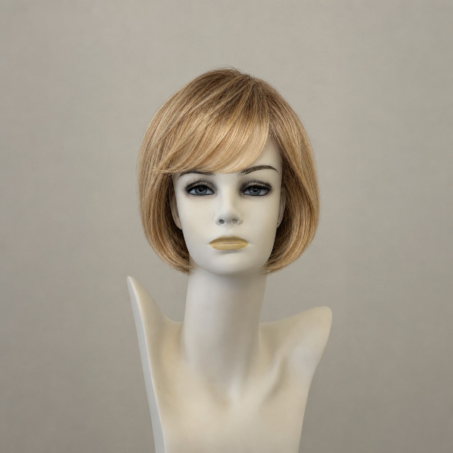 Lange, stufige Perücke in Blond-Braun-Melange mit Monofiler Lace Front