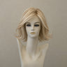 Kurze, blonde Perücke Page Hair 1 mit Ansatz in Champagner-Tönen.